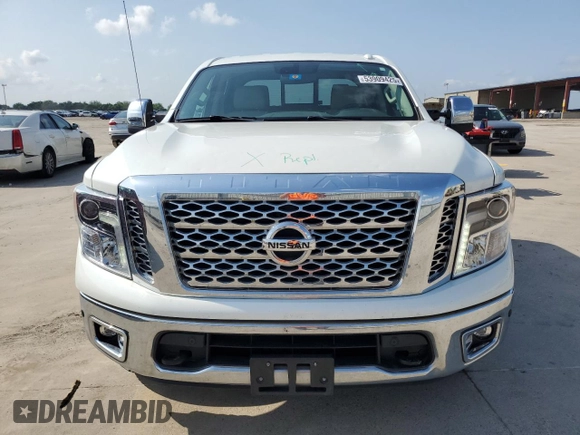2018 Nissan Titan SV z VIN 1N6AA1E57JN526185, wystawiony jako Copart lot #53909425 z przebiegiem 65 499 mil mil oraz Czysty tytuł • Clean title. Historia ofert i sprzedaży dostępna na DreamBid. Obrazek 5.