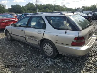 1997 Honda Accord EX with VIN 1HGCE189XVA001554, listed as a Copart auction lot 71355014 with 217,696 mi miles and Salvage Title. Bid and sale history available at carsss.com. Image 2.