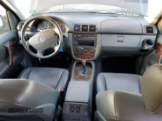 1999 Mercedes-Benz M-Class with VIN 4JGAB54E3XA092934, listed as a Copart auction lot 80631164 with 180,734 mi miles and Salvage Title. Bid and sale history available at carsss.com. Image 8.
