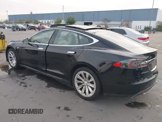 2016 Tesla Model S 70 with VIN 5YJSA1E11GF132015, listed as a IAAI auction lot 41408676 with 137,271 mi miles and . Bid and sale history available at DreamBid. Image 3.