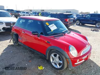 2003 MINI Hardtop with VIN WMWRC33413TC48601, listed as a IAAI auction lot 41418901 with 57,095 mi miles and . Bid and sale history available at DreamBid. Image 1.