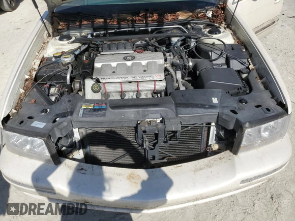 1999 Cadillac DeVille z VIN 1G6KD54YXXU794473, wystawiony jako Copart lot #79774804 z przebiegiem 44 601 mil mil oraz Czysty tytuł • Clean title. Historia ofert i sprzedaży dostępna na DreamBid. Obrazek 11.