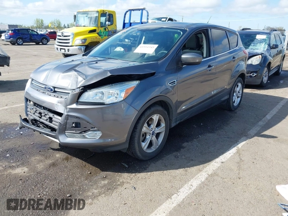 2014 Ford Escape SE with VIN 1FMCU9G96EUA06567, listed as a IAAI auction lot 41954345 with 88,294 mi miles and . Bid and sale history available at DreamBid. Image 2.