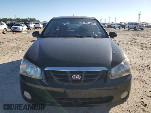 2005 Kia Spectra with VIN KNAFE161355073968, listed as a Copart auction lot 84543784 with 166,858 mi miles and Salvage Title. Bid and sale history available at carsss.com. Image 5.