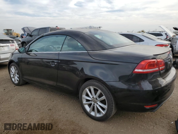 2015 Volkswagen Eos Komfort with VIN WVWBW8AH4FV001321, listed as a Copart auction lot 78718404 with 73,296 mi miles and Salvage Title. Bid and sale history available at DreamBid. Image 2.