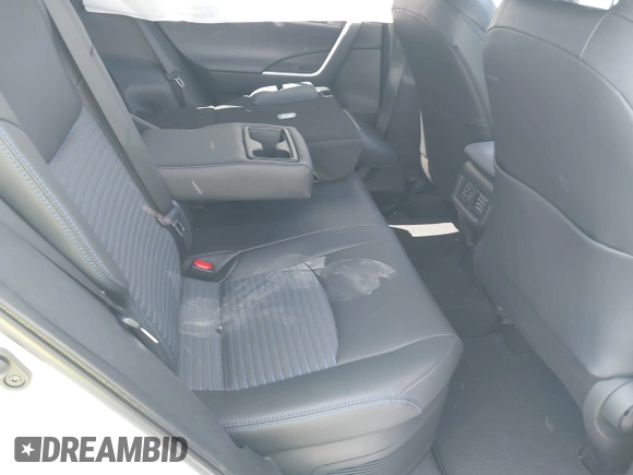 2024 Toyota RAV4 Hybrid XSE with VIN 2T3E6RFV9RW077941, listed as a IAAI auction lot 42012134 with 31,009 mi miles and . Bid and sale history available at DreamBid. Image 8.