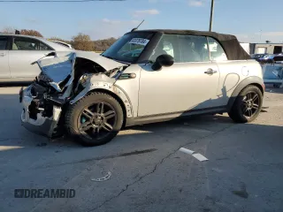 2013 MINI Convertible with VIN WMWZN3C59DT266152, listed as a Copart auction lot 83379704 with 88,272 mi miles and Salvage Title. Bid and sale history available at DreamBid. Image 1.