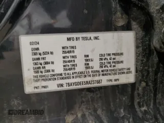 2024 Tesla Model Y Long Range with VIN 7SAYGDEE5RA237687, listed as a Copart auction lot 48366825 with 24,650 mi miles and Salvage Title. Bid and sale history available at DreamBid. Image 13.