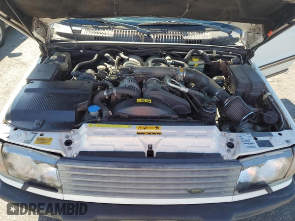 2002 Land Rover Range Rover z VIN SALPM164X2A463563, wystawiony jako Copart lot #73380104 z przebiegiem 174 462 mil mil oraz Czysty tytuł • Clean title. Historia ofert i sprzedaży dostępna na DreamBid. Obrazek 12.