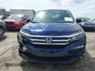 2018 Honda Pilot EX-L with VIN 5FNYF5H5XJB025960, listed as a IAAI auction lot 41843520 with 23,404 mi miles and . Bid and sale history available at DreamBid. Image 12.