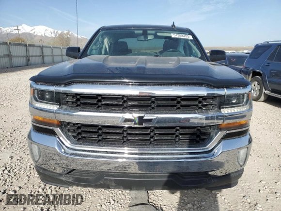 2018 Chevrolet Silverado 1500 LT with VIN 3GCPCREC7JG158457, listed as a Copart auction lot 51368205 with 118,159 mi miles and Salvage Title. Bid and sale history available at DreamBid. Image 5.