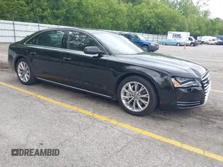 2013 Audi A8 3.0L with VIN WAURGAFD8DN012938, listed as a IAAI auction lot 42334901 with 64,235 mi miles and . Bid and sale history available at DreamBid. Image 1.