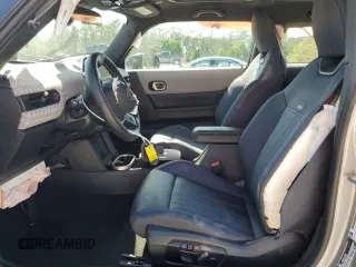 2025 MINI Hardtop Cooper S with VIN WMW23GD00S2W74060, listed as a Copart auction lot 52106175 with 410 mi miles and Salvage Title. Bid and sale history available at DreamBid. Image 7.