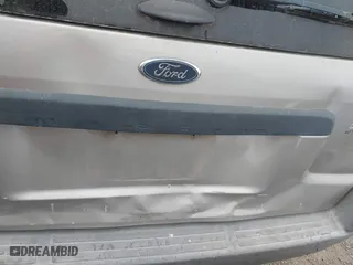 2001 Ford Escape XLT with VIN 1FMYU03141KB51890, listed as a IAAI auction lot 41621695 with 161,930 mi miles. Bid and sale history available at carsss.com. Image 12.