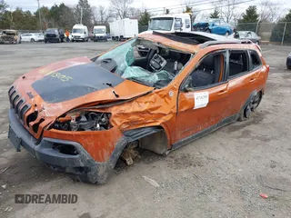 2015 Jeep Cherokee Trailhawk z VIN 1C4PJMBS9FW750858, wystawiony jako IAAI lot #41741305 z przebiegiem Nie podano mil oraz . Historia ofert i sprzedaży dostępna na DreamBid. Obrazek 17.