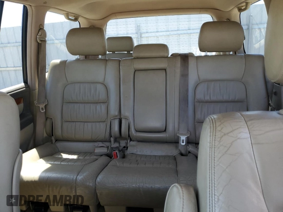 2004 Lexus LX 470 z VIN JTJHT00W843539918, wystawiony jako Copart lot #60612045 z przebiegiem 303 070 mil mil oraz Czysty tytuł • Clean title. Historia ofert i sprzedaży dostępna na DreamBid. Obrazek 10.