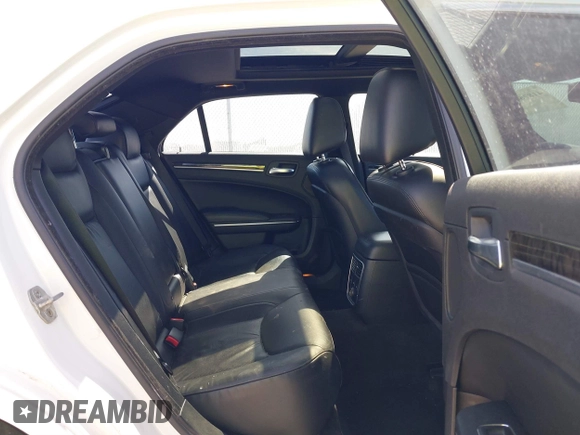 2011 Chrysler 300 with VIN 2C3CA6CTXBH559626, listed as a IAAI auction lot 41876062 with 112,045 mi miles. Bid and sale history available at carsss.com. Image 8.