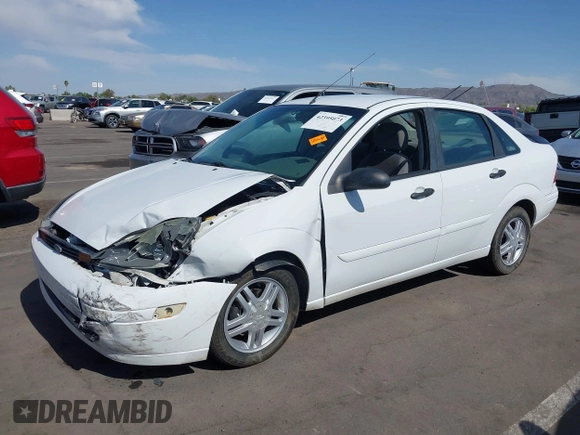 2004 Ford Focus SE with VIN 1FAFP34Z44W103852, listed as a IAAI auction lot 42395073 with Not provided miles and . Bid and sale history available at DreamBid. Image 2.