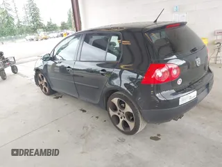 2009 Volkswagen Rabbit S z VIN WVWDB71K59W138874, wystawiony jako IAAI lot #42421953 z przebiegiem 134 616 mil mil oraz . Historia ofert i sprzedaży dostępna na DreamBid. Obrazek 3.