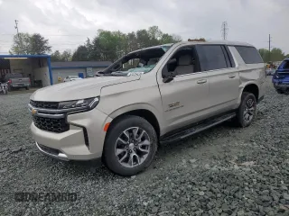 2023 Chevrolet Suburban LS z VIN 1GNSCBKD5PR231520, wystawiony jako Copart lot #52026425 z przebiegiem 20 068 mil mil oraz Szkoda całkowita • Salvage title. Historia ofert i sprzedaży dostępna na DreamBid. Obrazek 1.