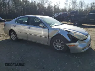 2002 Lexus ES 300 with VIN JTHBF30G420018931, listed as a Copart auction lot 51115275 with 292,777 mi miles and Salvage Title. Bid and sale history available at DreamBid. Image 4.