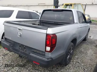 2018 Honda Ridgeline Sport with VIN 5FPYK2F19JB000713, listed as a IAAI auction lot 41300244 with 52,119 mi miles and . Bid and sale history available at DreamBid. Image 4.