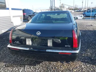 1999 Cadillac Eldorado Touring z VIN 1G6ET129XXU603042, wystawiony jako IAAI lot #41699955 z przebiegiem 81 704 mil mil oraz . Historia ofert i sprzedaży dostępna na DreamBid. Obrazek 17.