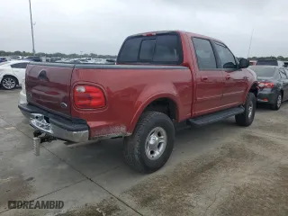 2001 Ford F-150 SuperCrew XLT with VIN 1FTRW08L41KD64626, listed as a Copart auction lot 74874234 with 0 mi miles and Salvage Title. Bid and sale history available at carsss.com. Image 3.