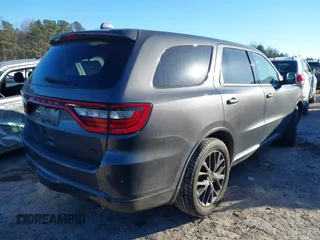 2016 Dodge Durango R/T with VIN 1C4SDJCTXGC387559, listed as a IAAI auction lot 41175018 with 64,692 mi miles and . Bid and sale history available at DreamBid. Image 4.