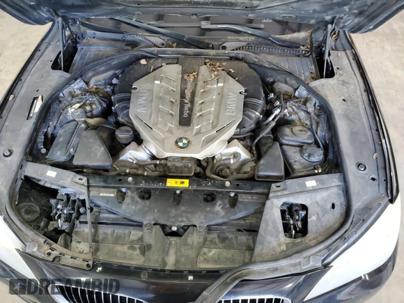 2011 BMW 7 Series with VIN WBAKX6C50BC197118, listed as a Copart auction lot 73686234 with 166,393 mi miles and Clean title. Bid and sale history available at DreamBid. Image 11.