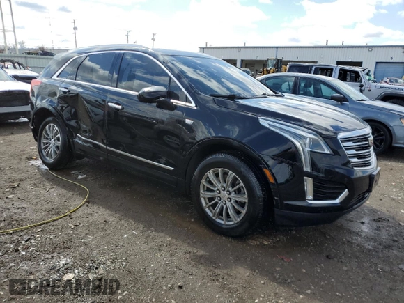 2017 Cadillac XT5 Luxury AWD with VIN 1GYKNDRSXHZ230720, listed as a Copart auction lot 49722095 with 108,972 mi miles and Salvage Title. Bid and sale history available at DreamBid. Image 4.