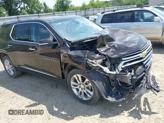 2018 Chevrolet Traverse High Country with VIN 1GNEVKKW9JJ136344, listed as a IAAI auction lot 42580659 with 124,324 mi miles and . Bid and sale history available at DreamBid. Image 1.