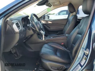 2017 Mazda 3 Touring z VIN JM1BN1L7XH1102372, wystawiony jako Copart lot #61180195 z przebiegiem 57 606 mil mil oraz Szkoda całkowita • Salvage title. Historia ofert i sprzedaży dostępna na DreamBid. Obrazek 7.