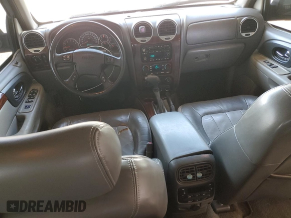 2004 GMC Envoy SLE with VIN 1GKDT13S142201271, listed as a Copart auction lot 50249705 with 248,364 mi miles and Salvage Title. Bid and sale history available at carsss.com. Image 8.