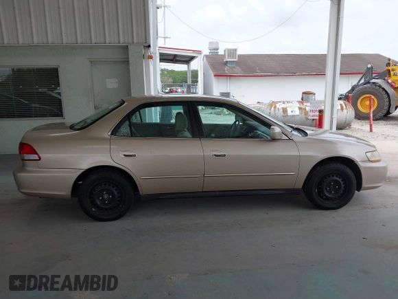 2002 Honda Accord LX z VIN 1HGCG56452A135666, wystawiony jako IAAI lot #42436949 z przebiegiem 103 652 mil mil oraz . Historia ofert i sprzedaży dostępna na DreamBid. Obrazek 13.