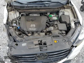 2016 Mazda CX-5 Sport with VIN JM3KE2BY0G0843786, listed as a Copart auction lot 54451275 with 111,363 mi miles and Salvage title. Bid and sale history available at DreamBid. Image 12.