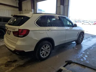 2014 BMW X5 sDrive35i with VIN 5UXKR2C55E0H31629, listed as a Copart auction lot 50957095 with 166,816 mi miles and Clean Title. Bid and sale history available at carsss.com. Image 3.