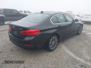 2019 BMW 5 Series 540i xDrive with VIN WBAJE7C51KWW21475, listed as a IAAI auction lot 41428380 with 53,872 mi miles and . Bid and sale history available at carsss.com. Image 4.