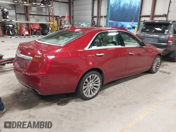 2016 Cadillac CTS Luxury Collection AWD z VIN 1G6AX5SX6G0124584, wystawiony jako IAAI lot #41235515 z przebiegiem 82 286 mil mil oraz . Historia ofert i sprzedaży dostępna na DreamBid. Obrazek 4.