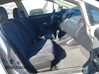 2009 Nissan Versa 1.8 S with VIN 3N1BC13E09L502085, listed as a IAAI auction lot 41869799 with 104,078 mi miles. Bid and sale history available at carsss.com. Image 5.