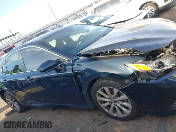 2020 Toyota Camry LE with VIN 4T1C11AK0LU864863, listed as a IAAI auction lot 41748371 with 82,063 mi miles and . Bid and sale history available at carsss.com. Image 13.