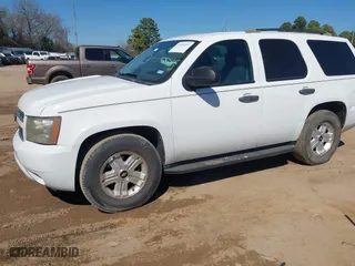 2012 Chevrolet Tahoe Commercial with VIN 1GNLC2E09CR185598, listed as a IAAI auction lot 41699321 with 202,198 mi miles. Bid and sale history available at carsss.com. Image 17.