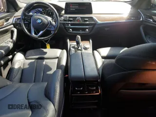 2018 BMW 5 Series 530e with VIN WBAJA9C52JB249402, listed as a Copart auction lot 55093055 with 117,033 mi miles and Salvage title. Bid and sale history available at DreamBid. Image 8.