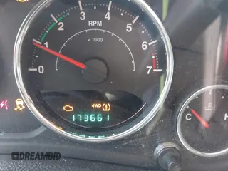 2012 Jeep Wrangler Unlimited Sport with VIN 1C4BJWDG2CL258264, listed as a IAAI auction lot 41880235 with 173,661 mi miles. Bid and sale history available at carsss.com. Image 16.