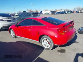 2000 Toyota Celica GT with VIN JTDDR32T2Y0044903, listed as a IAAI auction lot 41503556 with 164,988 mi miles. Bid and sale history available at carsss.com. Image 3.
