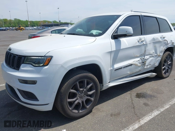 2021 Jeep Grand Cherokee Overland with VIN 1C4RJFCG6MC592296, listed as a IAAI auction lot 42170899 with 56,553 mi miles and . Bid and sale history available at DreamBid. Image 19.