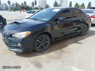 2016 Subaru WRX with VIN JF1VA1B67G9822025, listed as a IAAI auction lot 41756163 with 142,144 mi miles. Bid and sale history available at carsss.com. Image 2.