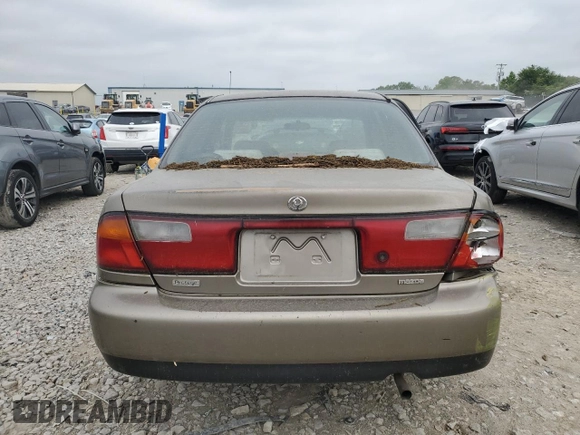 1997 Mazda Protege DX z VIN JM1BC1414V0103244, wystawiony jako Copart lot #56219745 z przebiegiem Nie podano mil oraz Szkoda całkowita • Salvage title. Historia ofert i sprzedaży dostępna na DreamBid. Obrazek 6.