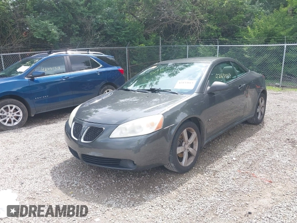 2007 Pontiac G6 GT z VIN 1G2ZH35N274176254, wystawiony jako IAAI lot #42433013 z przebiegiem 144 021 mil mil oraz . Historia ofert i sprzedaży dostępna na DreamBid. Obrazek 18.