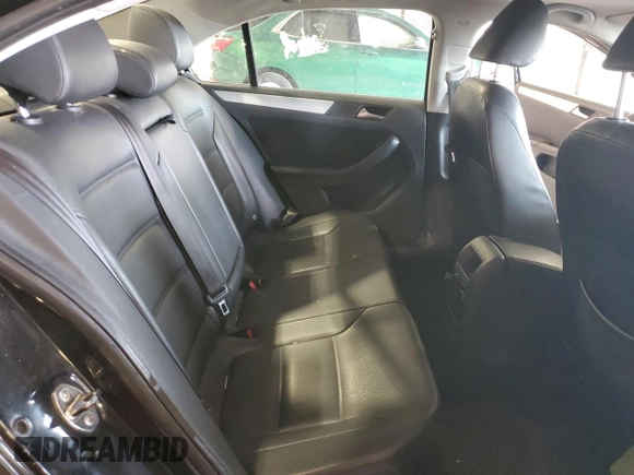 2013 Volkswagen Jetta SE with VIN 3VWDX7AJXDM427263, listed as a Copart auction lot 52502585 with 243,457 mi miles and Salvage title. Bid and sale history available at DreamBid. Image 11.